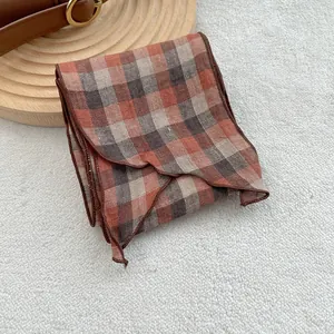 Linen checkered scarf in reddish brown and beige with a vintage texture and fine stitching