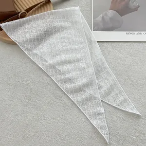 Elegant white lace neck scarf with floral cutout texture and long narrow triangle design