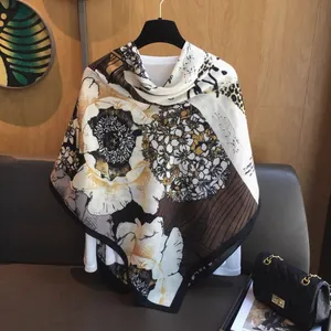 Elegant 130cm linen shawl featuring floral leopard prints and chic geometric borders
