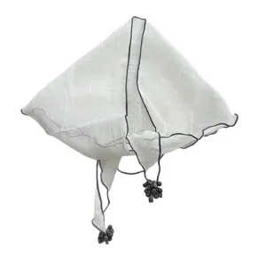 Elegant white lace shawl with grey contrast piping and decorative tassel pendants