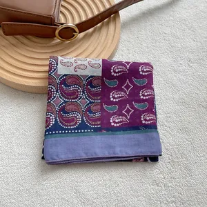Japanese style paisley print silk square scarf in bohemian colors on a plush background