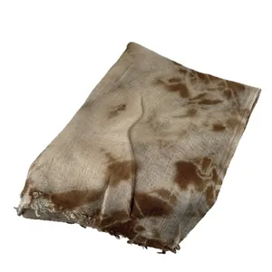 Elegant tie-dye wool scarf with brown and beige gradient textures and fringe edges