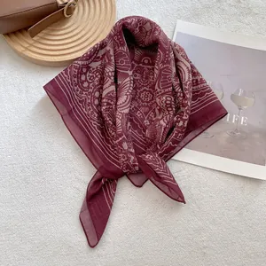 Vintage paisley print square neck scarf in wine red, displayed with premium accessories