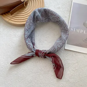 Vintage paisley silk square scarf in blue and burgundy, styled as a neckerchief or headband