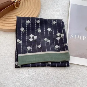 Vintage floral silk square scarf in navy blue with white pattern and green border detail