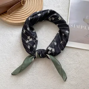 Elegant paisley square scarf in black and dark green with floral pattern and soft texture