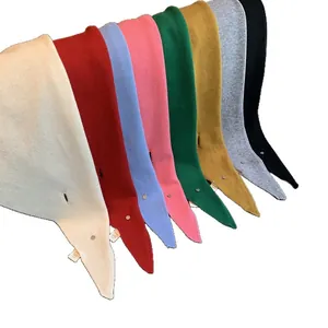 Soft 100% wool knitted triangle scarves in multiple colors with metal button detail