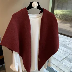 Solid wine red wool blend cross knit shawl for women with elegant drape and thick texture
