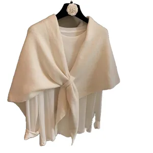 Minimalist white wool blend knit shawl wrap over basic long sleeve top for women