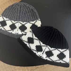 Detail view of 100% wool material and label on Nordic vintage diamond knit hat