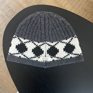 Close-up of thick rib knit texture and argyle pattern on 100% wool warm beanie
