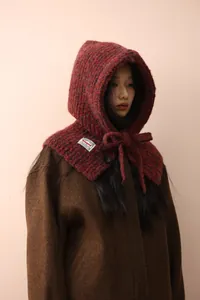 Detailed knit texture of burgundy wool-blend balaclava with Bonogeed brand tag