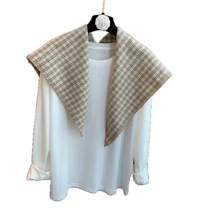 Plaid knitted triangle scarf shawl for women in beige and white checkered pattern