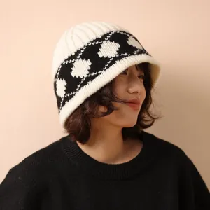 Retro Nordic black and white argyle wool knit bucket hat for winter warmth