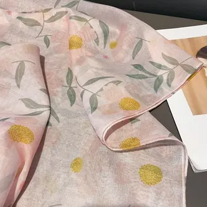 Pink floral cotton linen scarf with soft flower prints and breathable texture