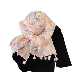 Pink cotton linen scarf with floral print and tassels for women's summer sun protection