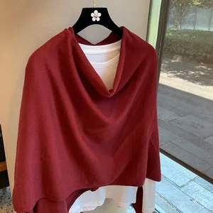 Elegant dark red knitted poncho shawl with asymmetric irregular hem for women