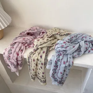 Floral pleated long scarves in pink, beige and blue with delicate vintage patterns