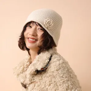 Beige knitted flower cloche hat for women in cozy wool-like texture for autumn and winter