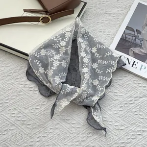 Floral embroidered lace triangle scarf in gray and white for elegant neck protection