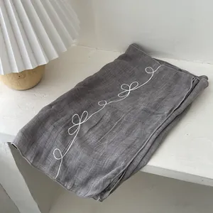 Long grey cotton-linen scarf with white bow embroidery for sun protection and decor