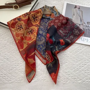 Ethnic paisley silk cotton square scarf with vibrant color block prints on a white fabric