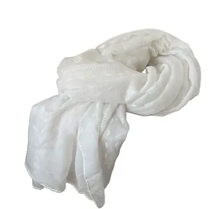 White bohemian linen cotton scarf with textured jacquard patterns for beach travel styling