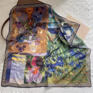 Detail of artistic Van Gogh Iris print square silk scarf with geometric border patterns
