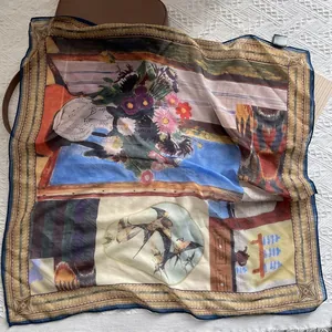 Detailed view of large ethnic color-block silk cotton square scarf with floral pattern