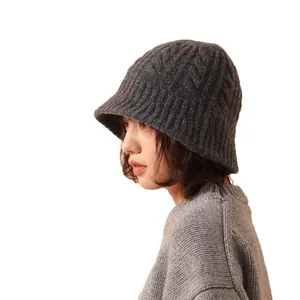 Women's dark gray merino wool knit bucket hat with cable pattern for autumn and winter