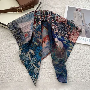 Detail showing vintage patchwork print and satin texture of the elegant silk cotton scarf