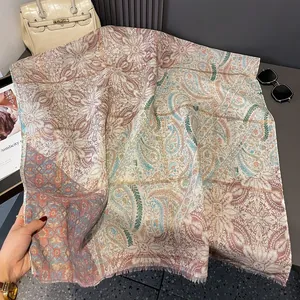Bohemian paisley print scarf with fringe details and soft pink mandala floral pattern