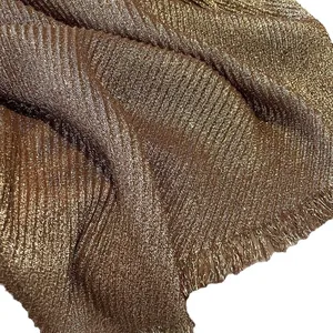 Golden pleated cotton linen scarf with metallic shimmer for versatile autumn styling