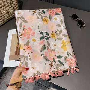 Pink bohemian floral sun protection scarf with elegant tassels for summer beach vacation