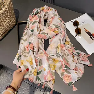 Pink floral summer scarf with tassels and bohemian flower print for beach sun protection