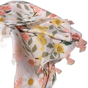 Pink floral bohemian beach shawl with fringes for summer sun protection and seaside travel