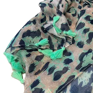Lightweight green leopard print chiffon scarf with decorative tassels for women
