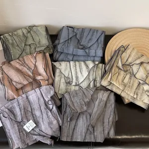 Tie-dye striped thin neck scarves set with natural wood texture and crinkle fabric