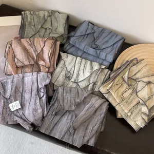 Lightweight pleated tie-dye skinny scarf available in multiple elegant gradient colors