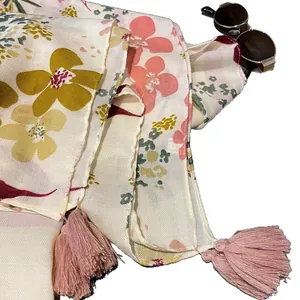 Ethnic style light beige floral shawl with pink tassels for travel and beach photography