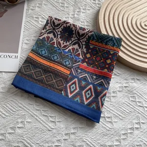 Bohemian geometric print silk scarf in navy and orange, elegant square neckerchief