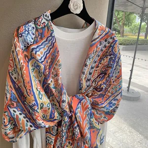 Bohemian paisley floral print shawl scarf for travel and beach photography in vibrant colors