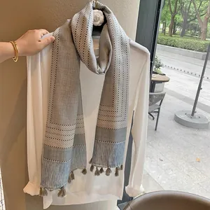 Elegant grey-blue checkered scarf with polka dots and tassels for summer travel