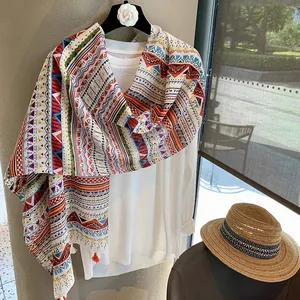 Bohemian geometric pattern scarf with fringe tassels and colorful ethnic print design