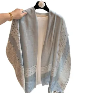 Lightweight light blue plaid linen-feel shawl with fringe tassels for summer travel