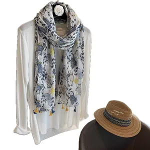 Lightweight scarf with cat owl print, yellow tassels, and floral pattern on white fabric