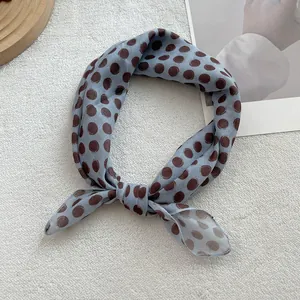 French retro blue cotton linen neck scarf with brown polka dot pattern on soft white background