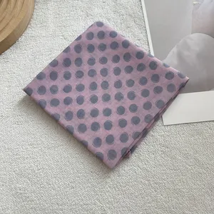 Detail of lavender cotton linen scarf featuring hand-painted grey polka dot patterns