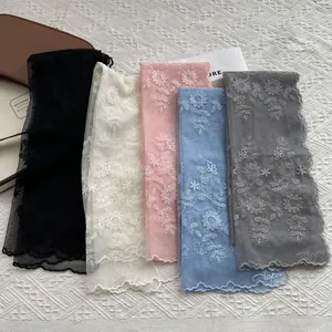 Lace leg warmers with floral embroidery in black beige pink blue and grey colors