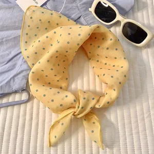 Chic yellow square scarf with teal polka dots made of thin cotton linen for women